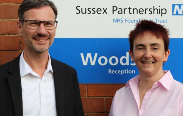 Two staff members from Work in Mind and NHS