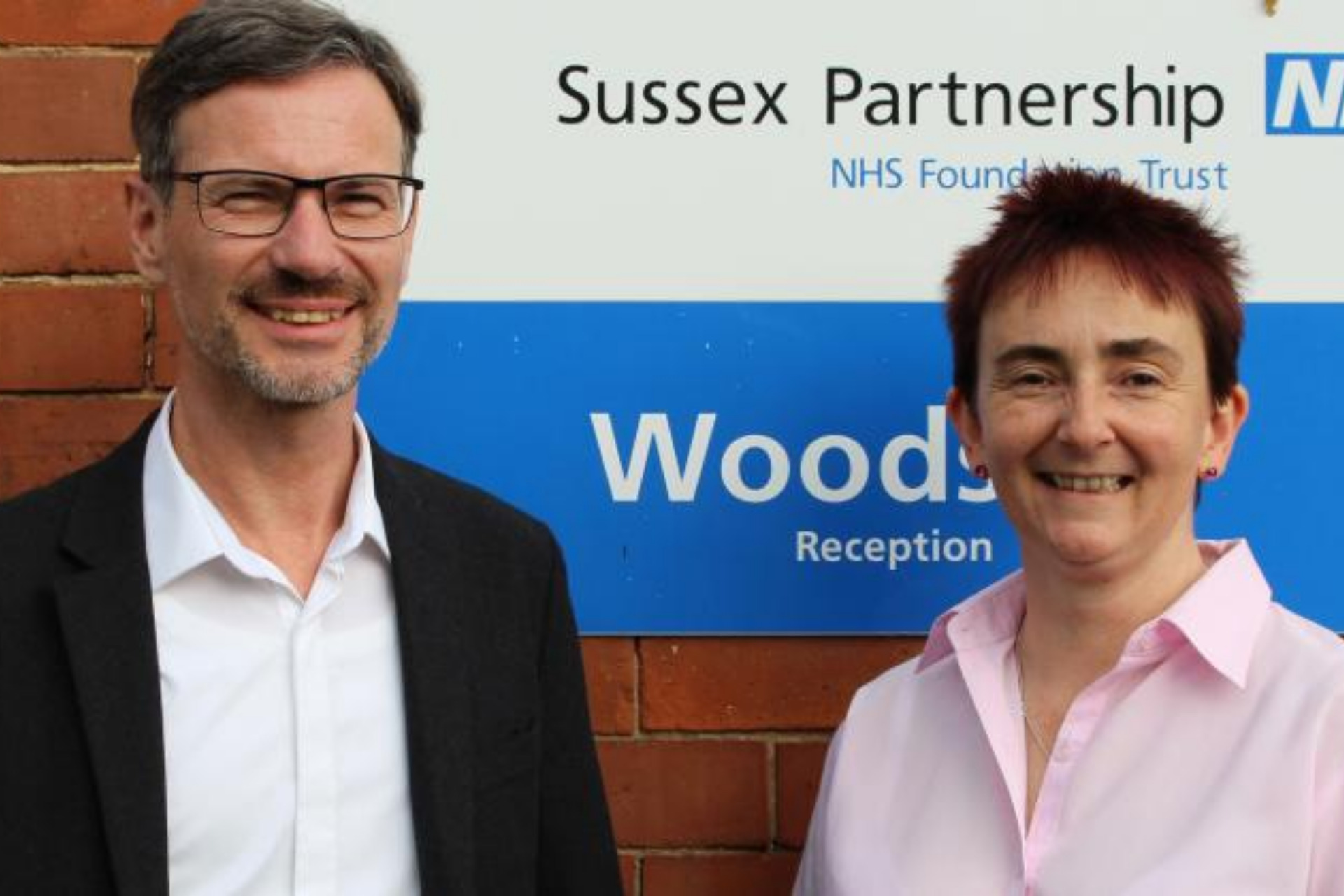 Two staff members from Work in Mind and NHS