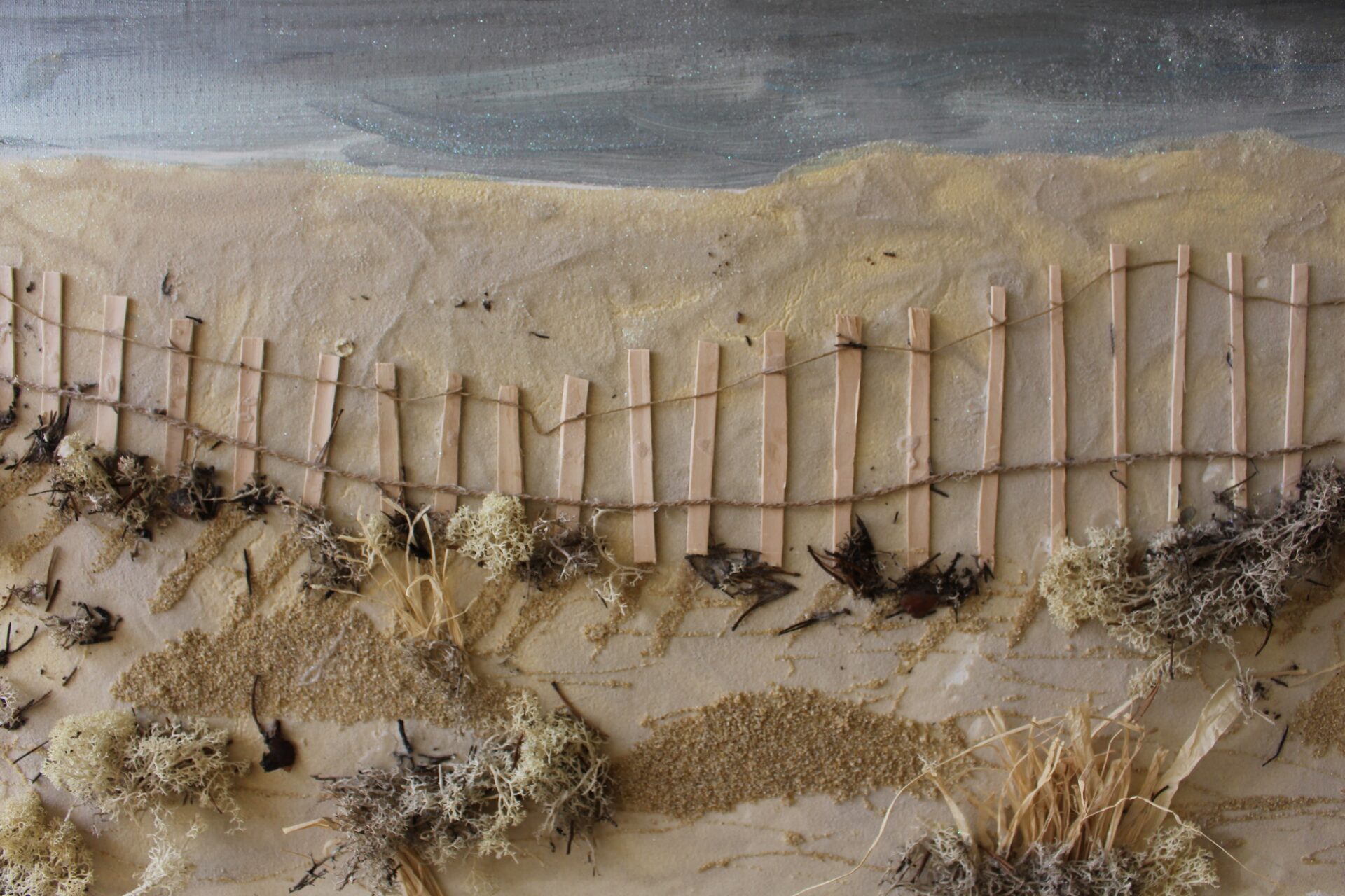 Image of a multi-media artwork of a beach scene
