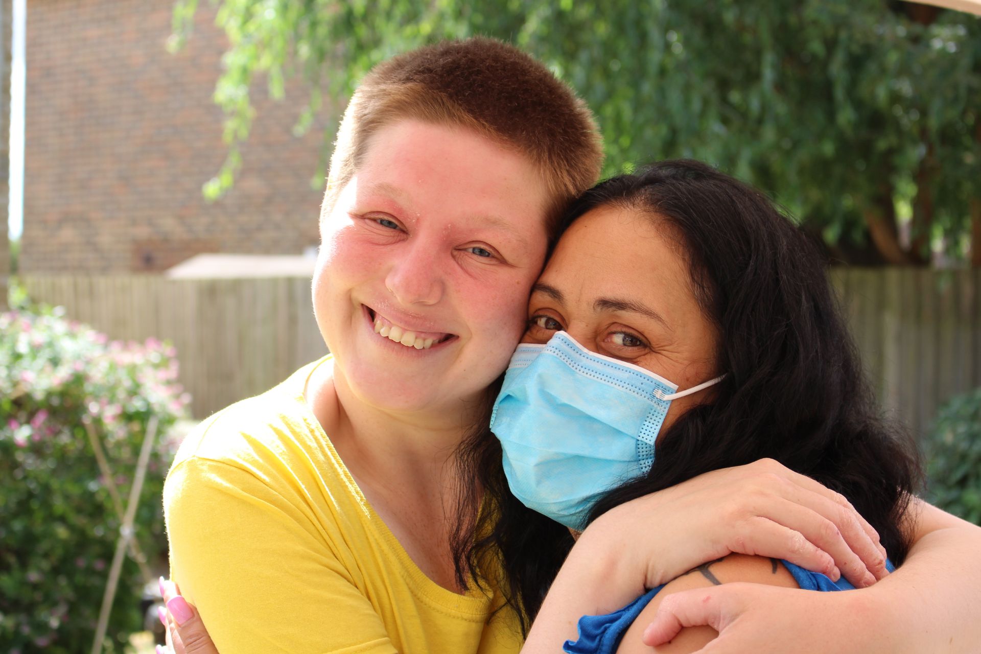 Southdown Support Worker and client smiling.