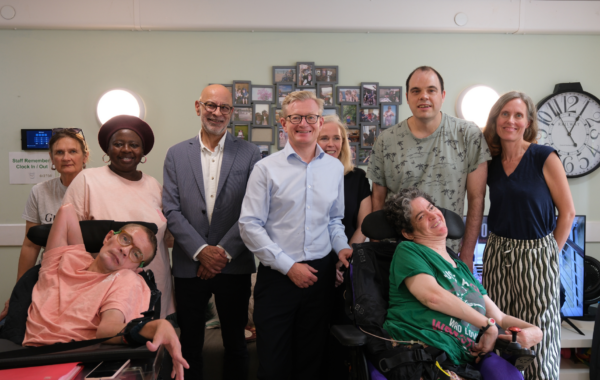 New members of Southdown's Board along with the Chief Executive Officer and Southdown clients face smilingly for a group photo.