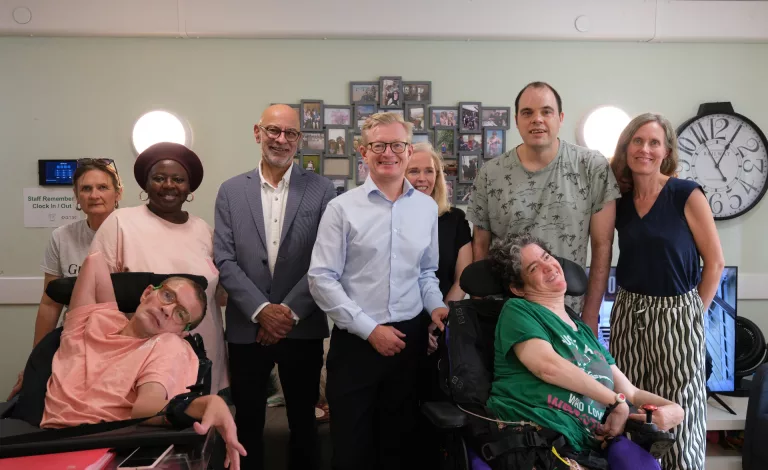 New members of Southdown's Board along with the Chief Executive Officer and Southdown clients face smilingly for a group photo.